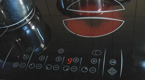 Control induction hob.The reflection of a pan is visible on the cooktop Stock-Footage 46941592