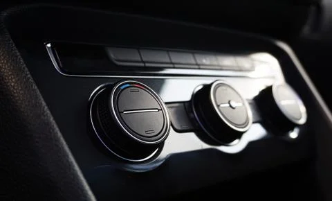 Control keys for the climate system of a modern car. Stock Photos