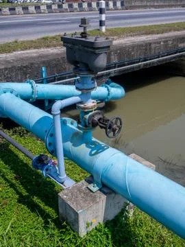 Control knobs for big water blue pipes Stock Photos