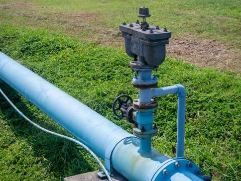 Control knobs for big water blue pipes 스톡 사진