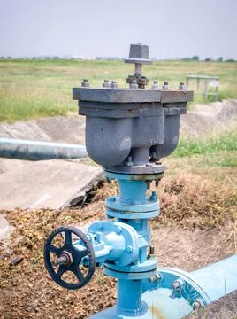 Control knobs for big water blue pipes Stock Photos