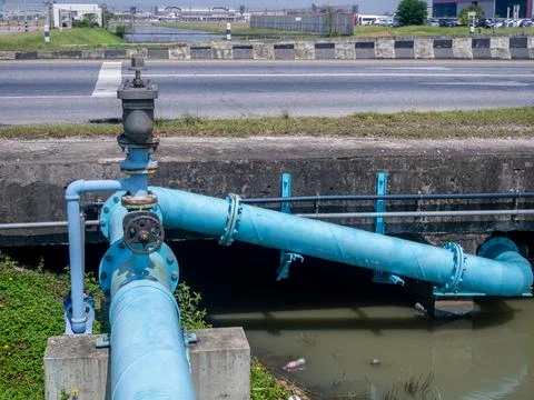 Control knobs for big water blue pipes Stock Photos