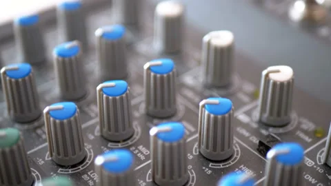 Control knobs on a sound mixing console 스톡 동영상 100857210