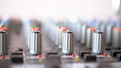 Control knobs on a sound mixing console 스톡 동영상 100873970