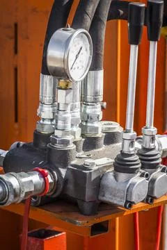 Control levers of the hydraulic machine Stock Photos