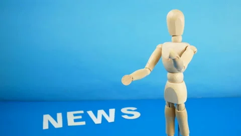 Control a marionette by strings on fingers and word news on blue background,  Stock Footage 139148320