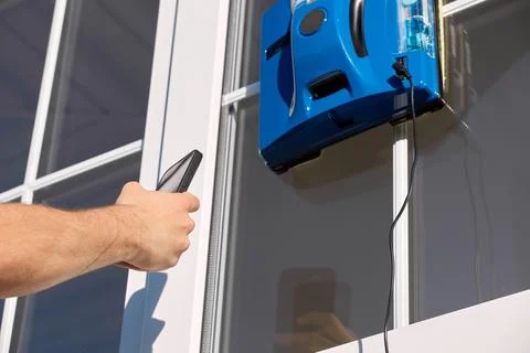 Control of a modern window washer robot via a mobile application Stock Photos
