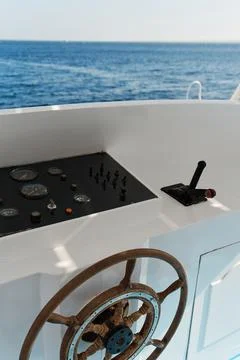 Control panel and steering wheel of the yacht Stock Photos