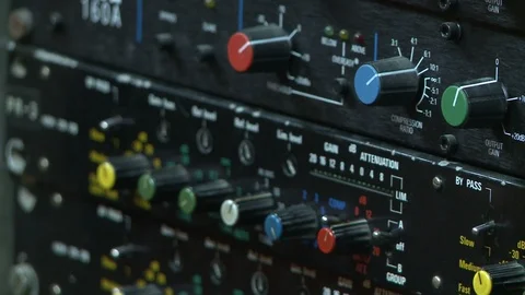 Control panel on the audio mixer with knob potentiometers Video stock 126783119