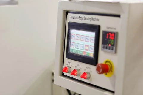 Control panel of automatic edge banding machine Stock Photos