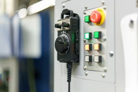 Control panel with buttons and dials used in machinery for operations in ma.. Stock Photos