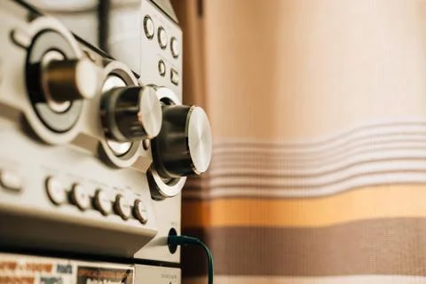 Control panel with buttons and level controls of modern hi-fi system at home Stock Photos