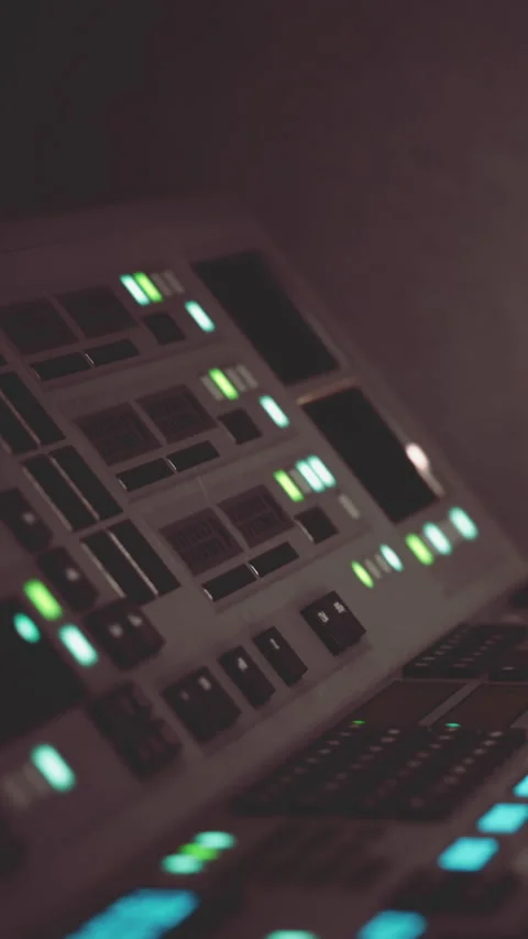 Control panel with buttons and lights at night in a technology setting Stock Footage 337958377