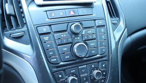 The control panel on the car. Close-up. Stockbeeldmateriaal 90642396