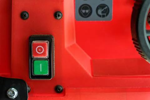 Control panel for controling and regulating red electrical table saw Stock Photos
