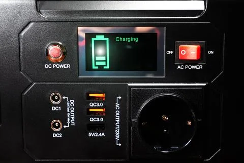 Control panel display of lithium Portable Power Station. Charging laptop sm.. Stock Photos