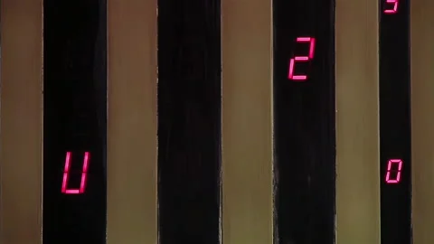 Control Panel of an Elevator, Metal Elevator Panel with Red Numbers of Floors.   Stock Footage 244962719