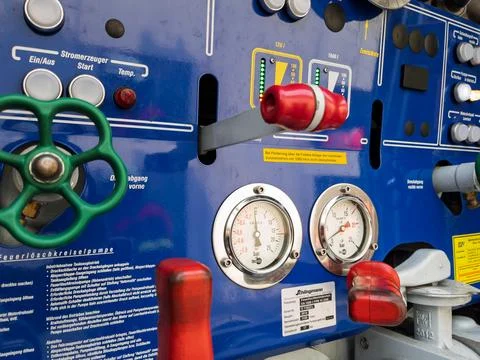 Control Panel of a Fire Truck with Pressure Gauges and Switches Stock Photos