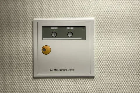 Control panel for gas management system on wall in facility Stock Photos