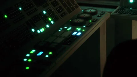 Control panel with green lights in a dark room during a technical operation Stock Footage 344968544