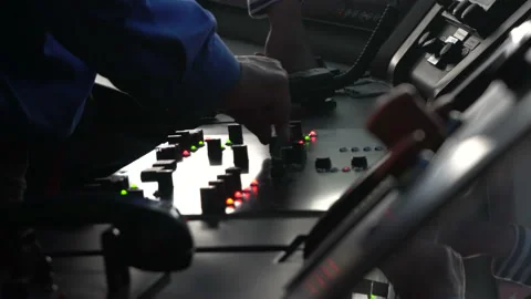 Control panel. Hand switches the switch. Keyboard and radio station in Stock Footage 233379744