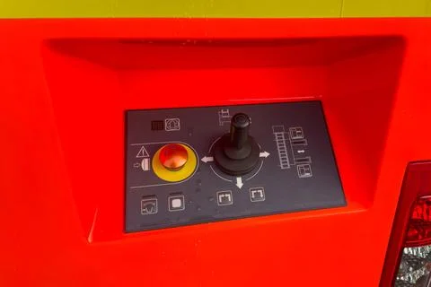 Control panel with joystick and start button on a fire truck. Stock Photos