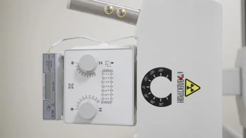 Control panel with labeled levers adjusts radiation output Stockbeeldmateriaal 311621712