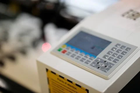 Control panel of laser cutter engraving machine Stock Photos