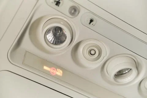 Control panel of lights and air-conditioning system in the cabin of an airpla Stock-Fotos