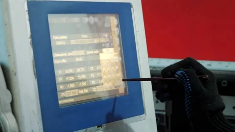 Control panel for machine. close-up. Worker entering data into a cnc machine by Video stock 204928493