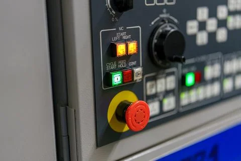 Control panel of a machine in a workshop with buttons and indicators showin.. 스톡 사진
