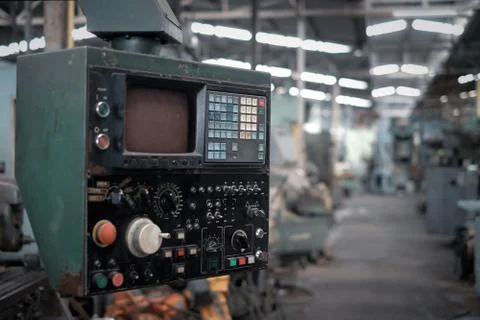 Control panel for operate machine with factory background. Stock Photos