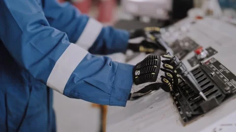 Control panel operation. Gloved hands press the control levers. Stock Footage 316320920