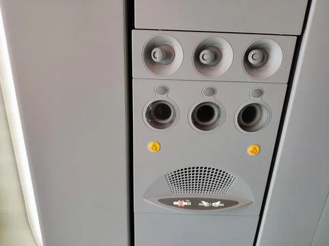 Control panel overhead and icons in economy class cabin Stock-Fotos