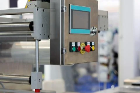 Control panel of plastic food tray sealing machine Stock Photos
