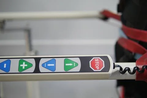 Control panel with stop and navigation buttons in use at facility Stock Photos