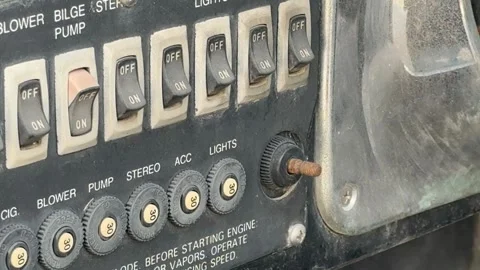 Control panel with various switches and dials, background for technical or .. Stock Footage 327811171