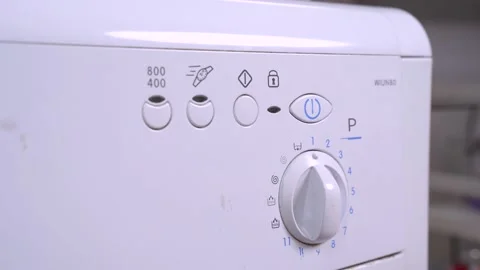 Control panel of washing machine. hand presses the power button Video stock 130638881