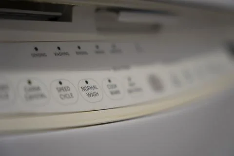 Control panel on a white dishwasher Stock Photos