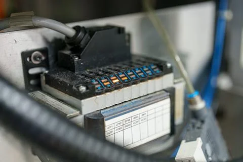 Control panel with wiring and buttons located in an industrial setting duri.. Stock Photos