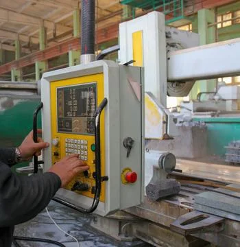 Control panel in a workshop used for operating machines to cut materials Stock Photos