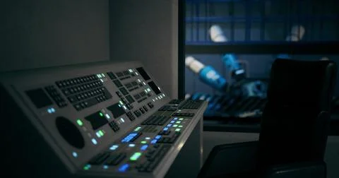 Control room with advanced technology and robotic arms in the background Stock Illustration