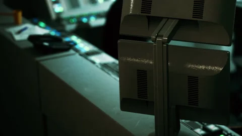Control room with computer monitors in a working environment at night Stock Footage 342042317