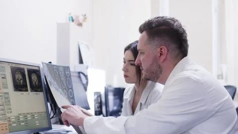 In the control room, doctors discuss the... | Stock Video | Pond5
