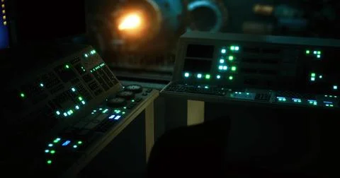 Control room with glowing buttons in dim lighting at a facility Stock Illustration