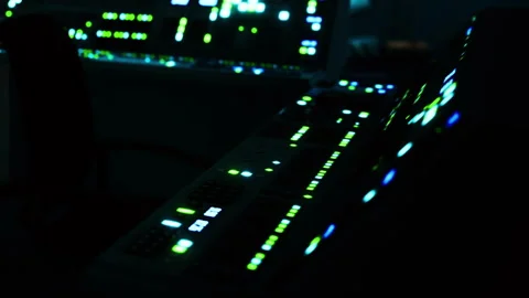 Control room with glowing screens during late night work hours Stock Footage 344965991