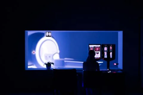 In Control Room Radiologist Diagnosis while Watching Procedure and Monitors.. Stock Illustration