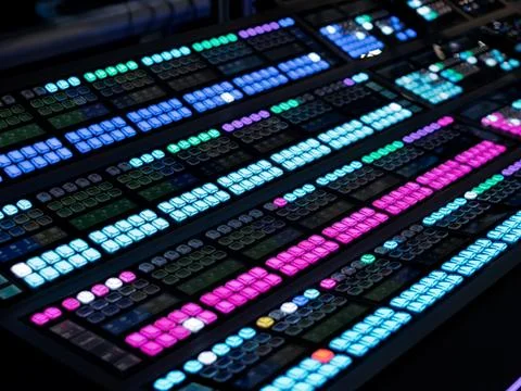 Control Room Video Editing Console with Colorful Buttons Stock Photos