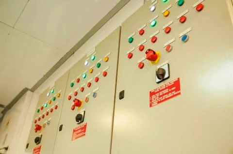 Control Switch panel of industrial equipment with buttons aboard modern ship Stock Photos