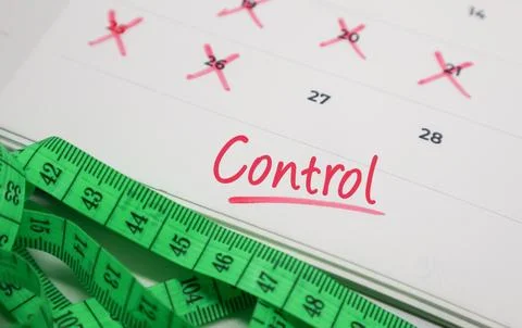 Control text on calendar with measuring tape. Concept of health discipline,.. Stock Photos